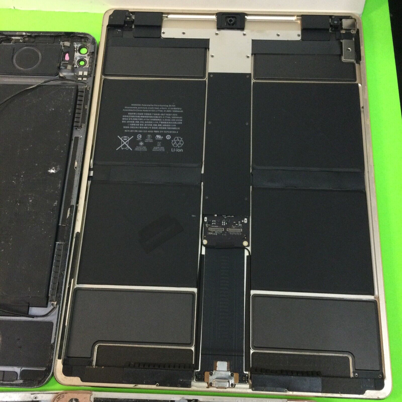 Lot of 8 assorted iPad housings for parts or repair