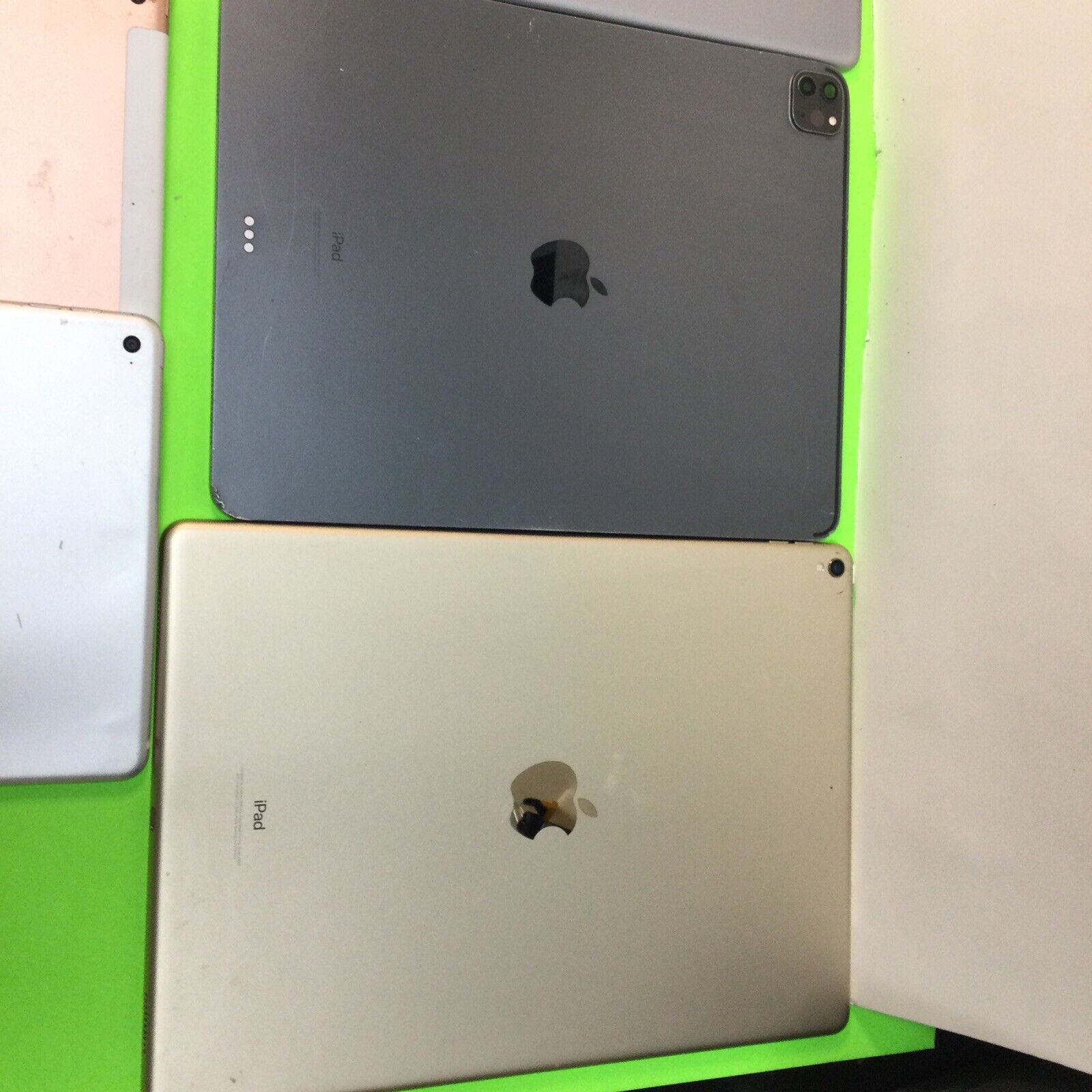 Lot of 8 assorted iPad housings for parts or repair