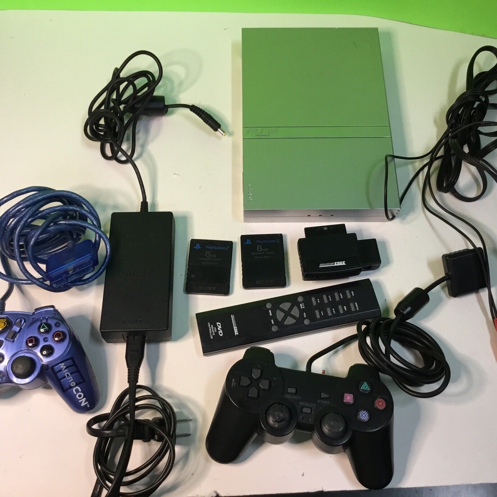 PlayStation 2 Slim Silver bundle SCPH-77001 FOR PARTS DISC DRIVE NOT SPINNING