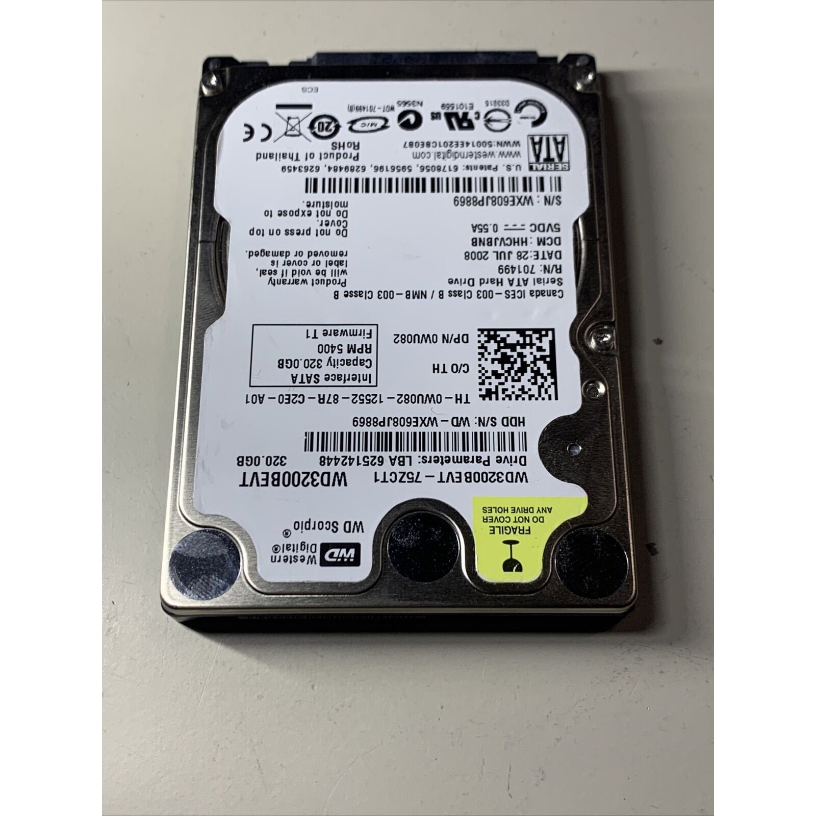 WD WD3200BEVT-75ZCT1 320GB SATA 2.5” Hard Drive 0WU082 2060-701499-000