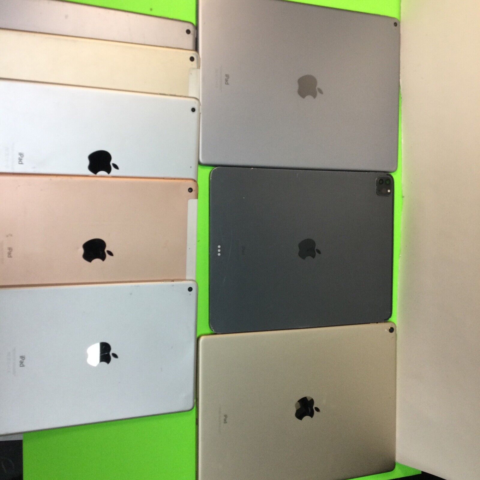 Lot of 8 assorted iPad housings for parts or repair