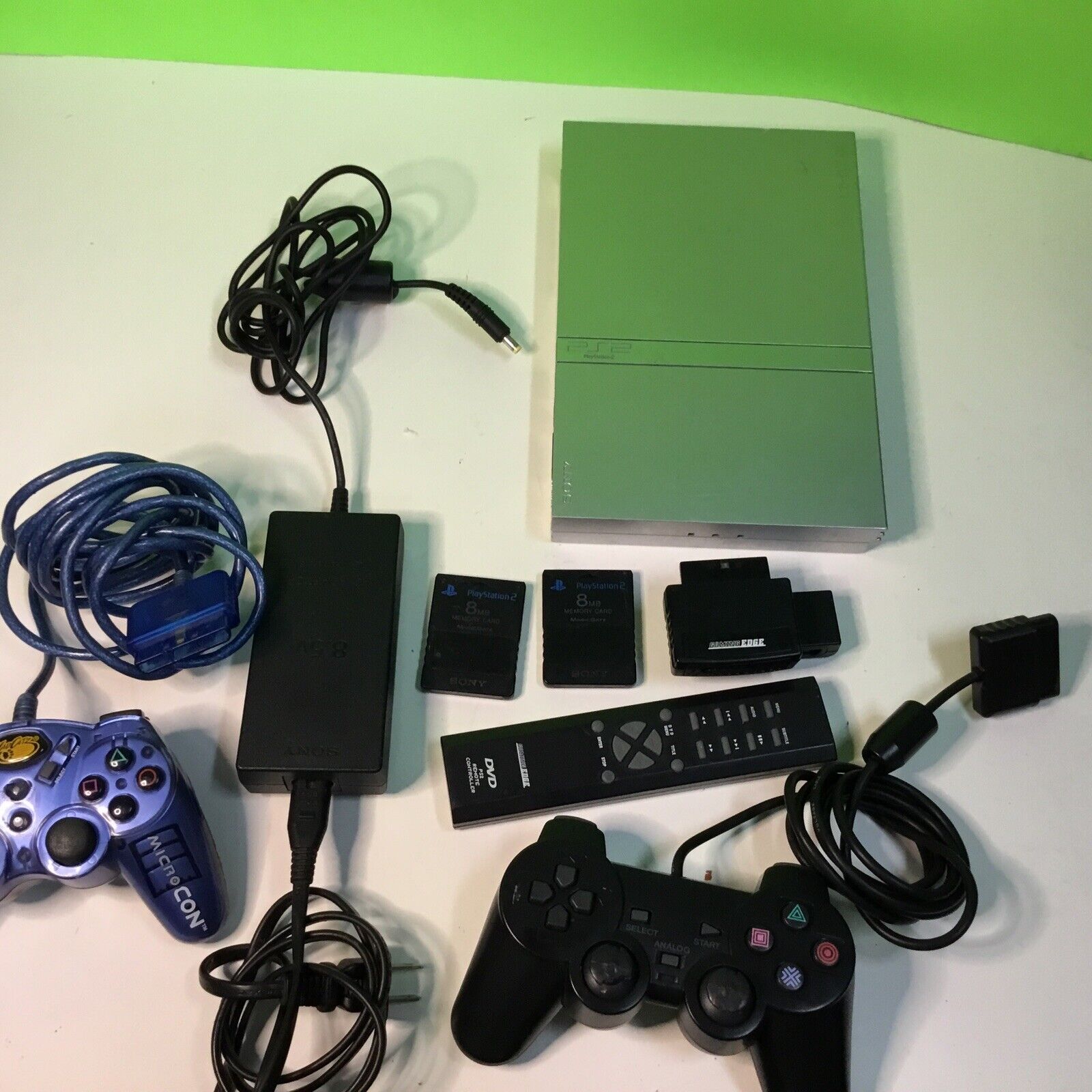 PlayStation 2 Slim Silver bundle SCPH-77001 FOR PARTS DISC DRIVE NOT SPINNING