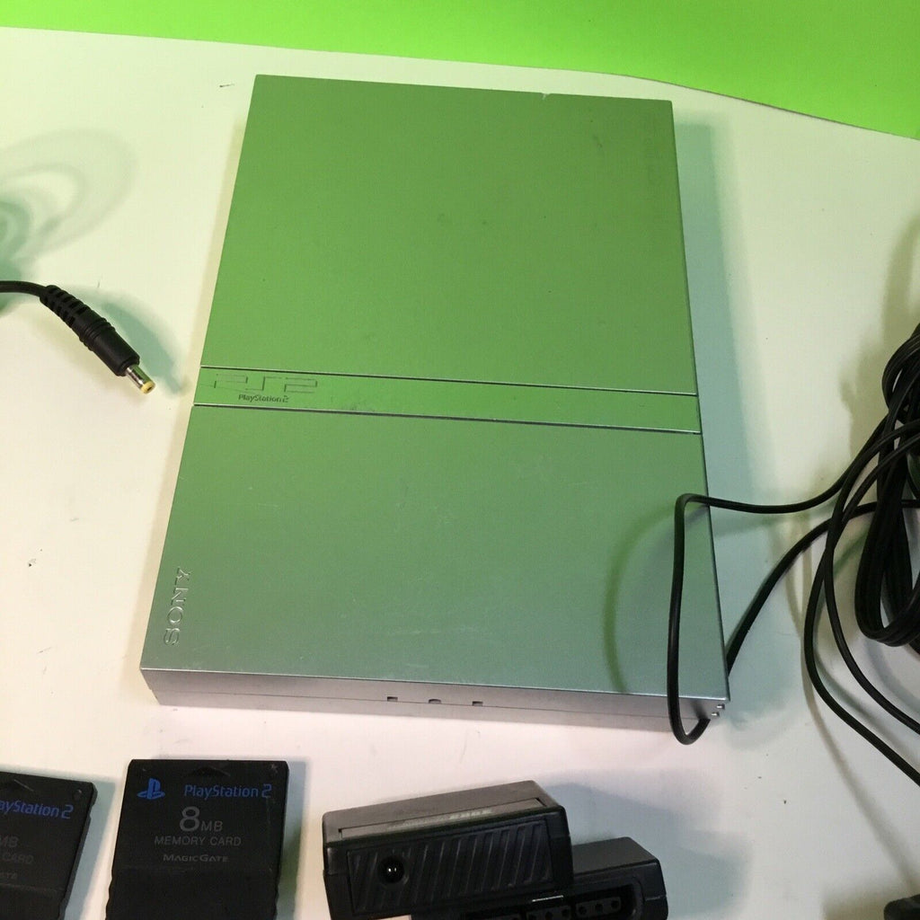 PlayStation 2 Slim Silver bundle SCPH-77001 FOR PARTS DISC DRIVE NOT SPINNING