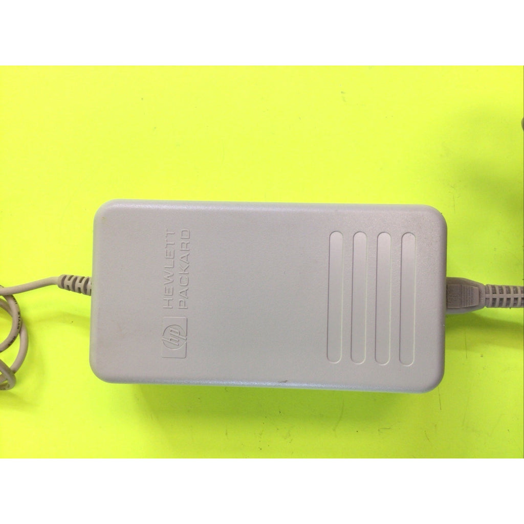 Hewlett Packard AC Power Adapter 1.1A 18V C6409-60014