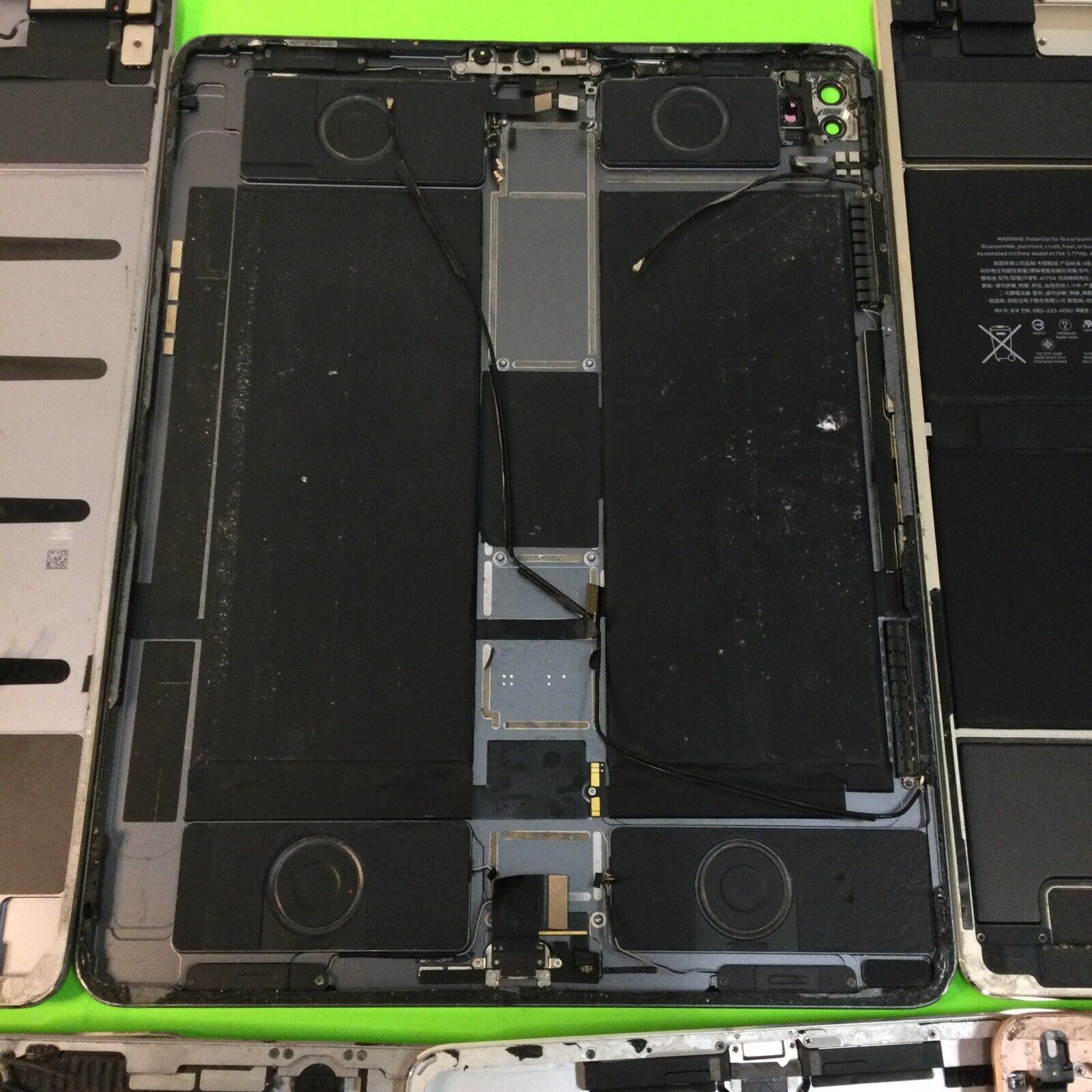 Lot of 8 assorted iPad housings for parts or repair